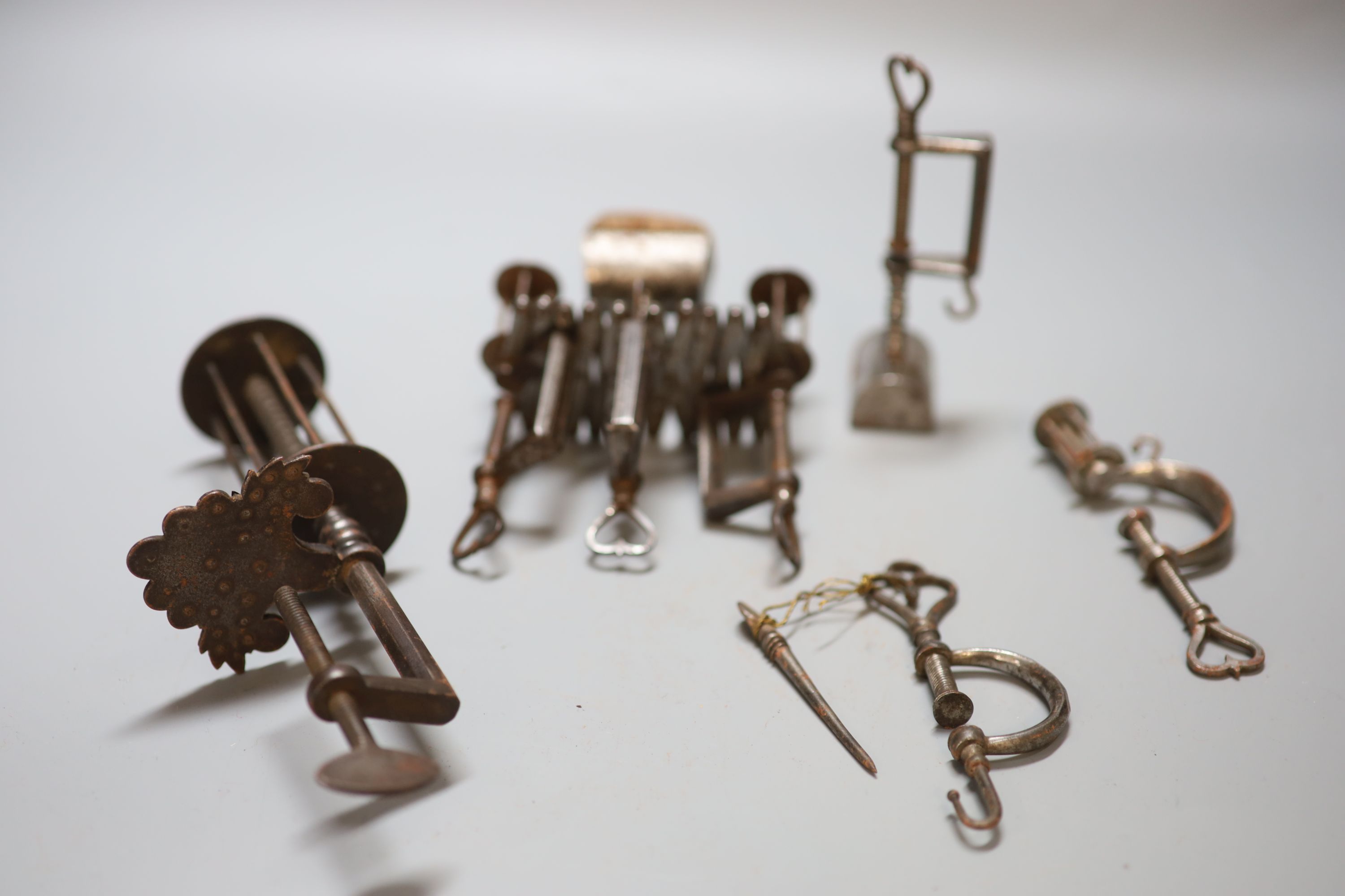 A group of four 18th / 19th century steel sewing clamps